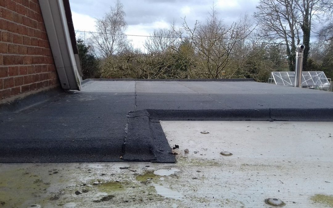 Can Flat Roofers Fix Ponding Water on a Flat Roof?